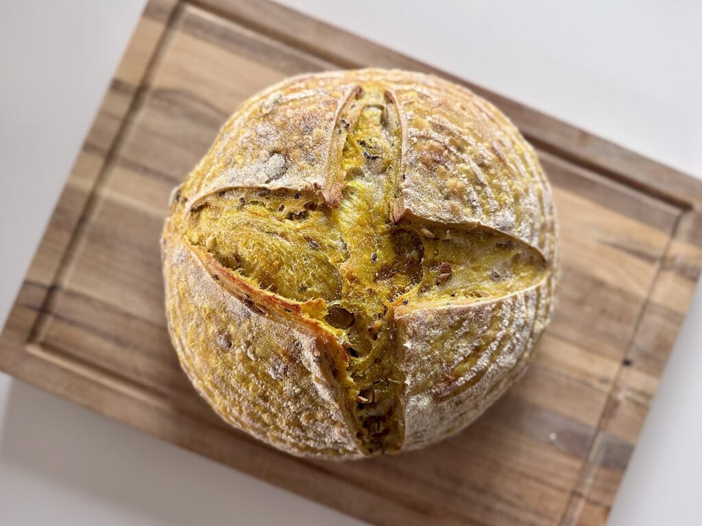 Sourdough bread January 2026 Sarah Stierch 01 | オンザショア立川店 立川駅徒歩1分年中無休の溶岩ホットヨガスタジオ ターメリック亜麻の実かぼちゃの種ごまを加えて焼いた自家製のサワードウのパン 立川駅徒歩1分年中無休の溶岩ホットヨガスタジオ